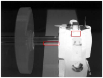 Thermal image of bearing housing and shaft with regions of interest